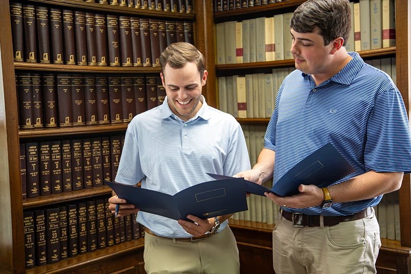 mda professional group cpa looking over files with client