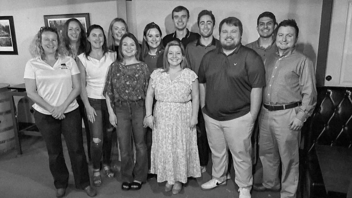 Thirteen MDA team members at a team night out